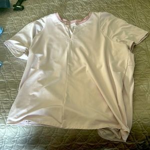 Lucky in Love tennis top with sheer detailing at collar. Can tie the back